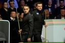 Ronnie O’Sullivan (left) and Ryan Day look at the table as the seven-time world champion carved out a 10-6 lead at the Crucible (Martin Rickett/PA)