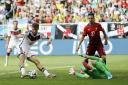 Muller hits hat-trick as Germany crush Ronaldo's Portugal