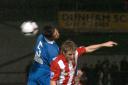 Lee Elam challenges for a header during Alty's Setanta Shield clash with Farsley.