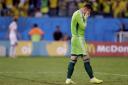Russia's goalkeeper Igor Akinfeev reacts after letting in the opening goal