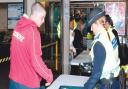 Passengers at Altrincham Metrolink station pass through special mobile metal detectors as part of the ongoing campaign to clampdown on knife crime
