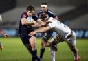 Sale Sharks' AJ MacGinty in action against Exeter