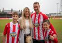 Jake Moult with his wife, Rebecca, and sons Archie, left, and Jude after his testimonial game last weekend. Picture by Jonathan Moore