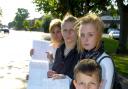 Youngsters with the petition on Higher Road