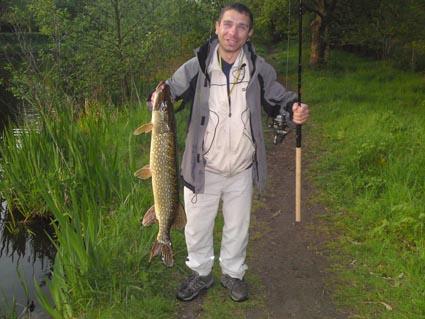 Steve Duzbury was walking his dog down the canal next to Woodbourne Road, Sale and watched this man catch this pike!
