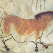 A bison attacking a man from Lascaux