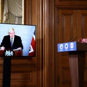 Prime Minister Boris Johson, who is self-isolating, appearing via video link, and Director of the Oxford vaccine group Professor Andrew Pollard during a media briefing in Downing Street, London, on coronavirus (COVID-19).
