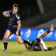 Sale Sharks' AJ MacGinty in action against Leicester