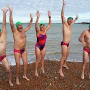 The team were only allowed to wear swimming costumes, hats and goggles.