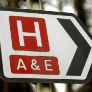 A sign for a hospital and its Accident and Emergency department,