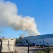 Smoke was seen across Altrincham today after a fire broke out at a business park.