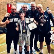 Timperley ABC coaches, from left, Andy, Clark, Mark and Dave with gold medal winner Lennon Blinkhorn