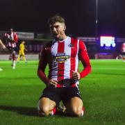 Alex Newby after scoring Alty’s late winner. Picture by Jonathan Moore