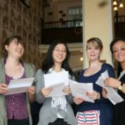 Pupils at Altrincham Grammar School For Girls celebrate their results -(left to right)Louise Campion, Yan Qin, Emily Firmston, Yasmin Lawal