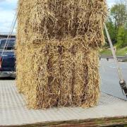 The driver had been carrying bails of hay