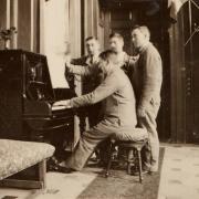 Soldiers playing the piano in the soldiers' Rec Room at the Stamford Military Hospital Dunham Massey