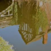 This picture of Sale Metro stop reflected in the Bridgewater Canal was taken by Gill Barker, of Sale