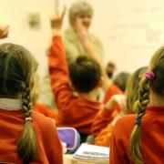File photo dated 03/12/03 showing young primary school children. Education Secretary Damian Hinds has announced proposals to scrap the system of two standards to hold schools in England to account for their performance and replace them with a new single