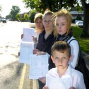 Youngsters with the petition on Higher Road
