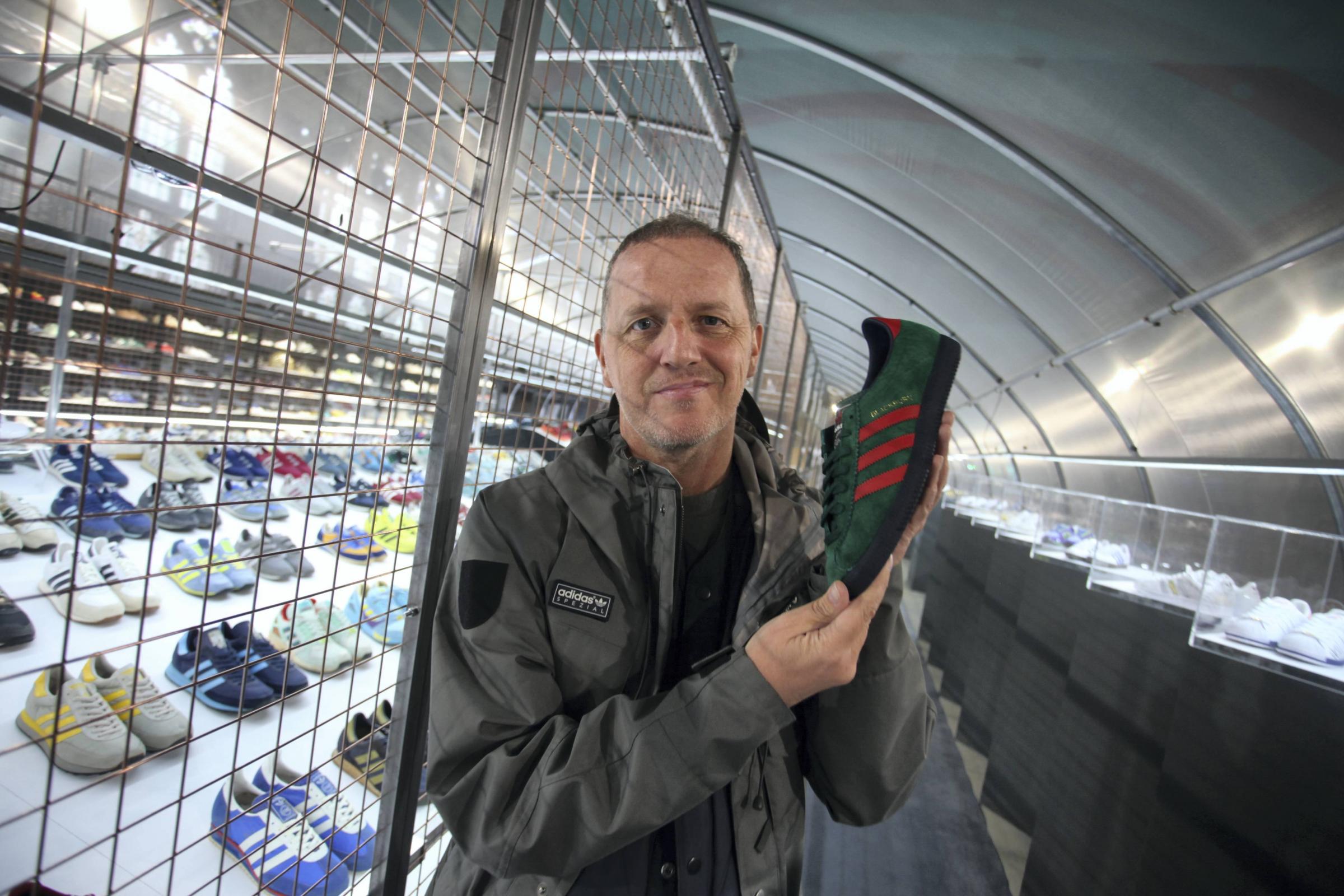 Gary Aspden with the Adidas Blackburn Spezial trainer at The Cotton Exchange, part of the British Textile Biennial, 2019