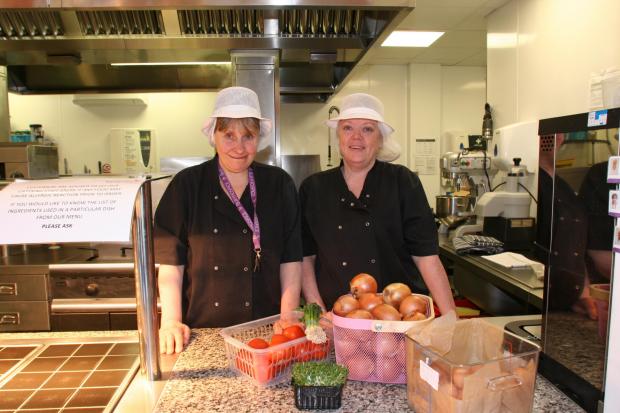 Christa McAdam, left, and Diane Fenton in Bury Hospice's kitchen