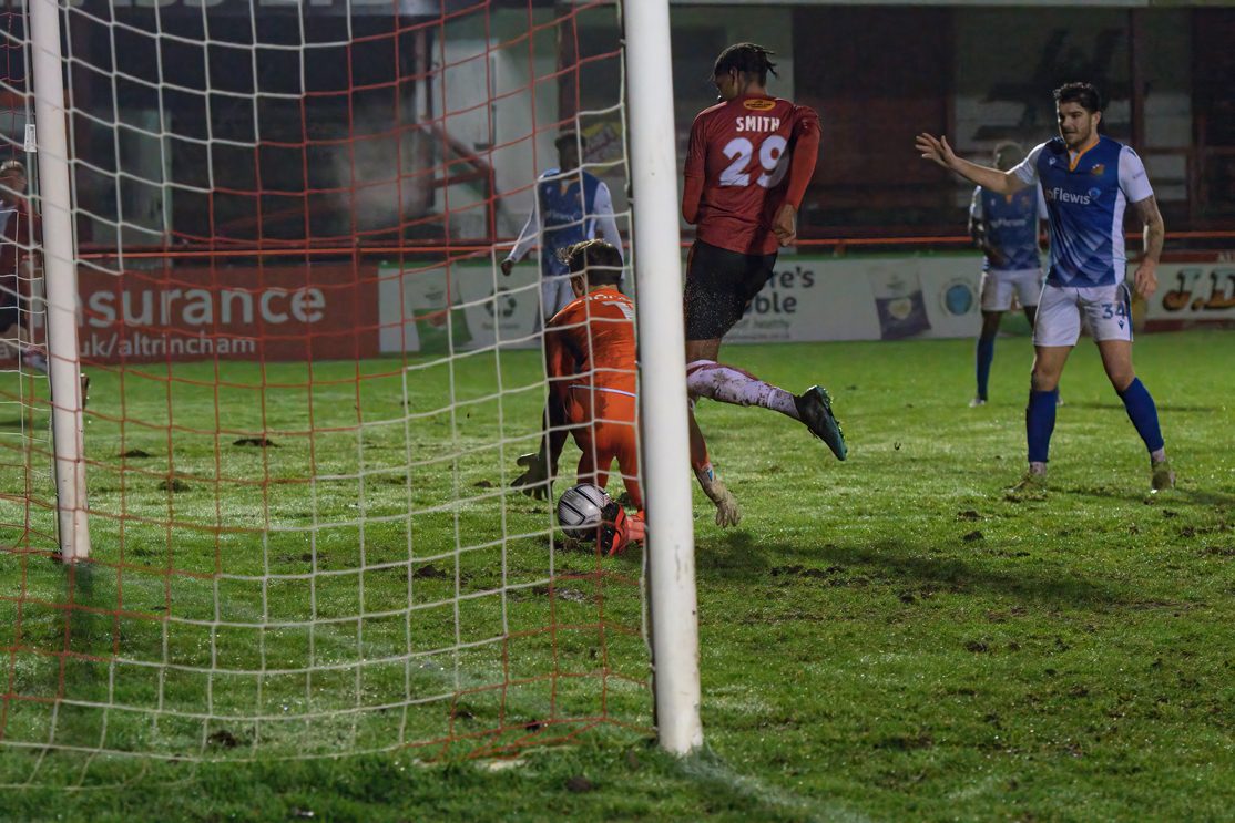 ON TARGET: Alistair Smith turns home Altrincham’s second in Tuesday night’s 2-0 win over Wealdstone. Pictures:Michael Ripley Photography