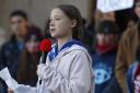 Swedish climate activist Greta Thunberg speaks to several thousand people at a climate strike rally Friday, Oct. 11, 2019, in Denver. The rally was staged in Denver's Civic Center Park. (AP Photo/David Zalubowski).