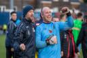 Alty boss Phil Parkinson, left, and goalkeeper Tony Thompson celebrate after the win against York. Picture by Jonathan Moore