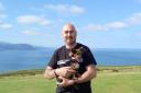 Wayne with Betty the Jackahuahua on top of the Great Orme