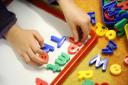 Applications for free childcare in England will be offered to more families soon.