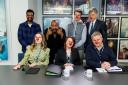 Sir Lenny Henry, with (left to right) Romesh Ranganathan, Jessica Hynes, Monica Dolan, Hugh Skinner, Hugh Bonneville, and Richard Madeley, during the filming of his W1A replacement sketch as part of the Red Nose Day 2024 campaign