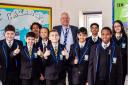 Kingsbury High School headteacher Alex Thomas with pupils after a 'good' Ofsted report