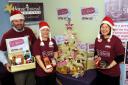 Pictured Alan Savage, Lucy Gill and Alison Broadhurst with the Santa senior stand