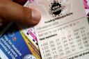 Players urged to check lottery numbers as £122million ticket bought in UK
