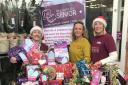 Presents are collected at the donation day at Sainsbury Sale by, left to right,: Lucy Gill (director, Home Instead), Joanne Culbert (Sainsbury’s Sale), Sarah Maunder (community support manager, Home Instead)