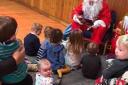 'Santa' Mike Freeman entertains the children