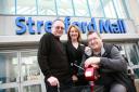 Trafford Shopmobility manager Phil Simmons with Stretford Mall centre administrator Maria Garrity, and Traffod Shopmobility service user Kevin Lomas