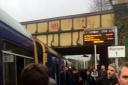 CHAOS: Passengers at Lostock couldn't squeeze onto trains this morning following a rush hour cancellation