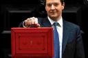 Chancellor George Osborne and his famous red box