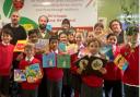 Pupils and children in hospital have been given 'the gift of reading' through the initiative