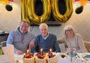 Bert enjoying his 100th birthday with his son Robin and daughter Brenda