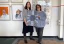 Sara Fixter, left, and Jo Cushing from Inch Arts  with a piece of art made by Geraldine Montgomerie, inspired by loss