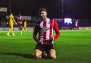 Alex Newby after scoring Alty’s late winner. Picture by Jonathan Moore
