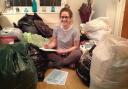 Francesca Fox sorting her donations