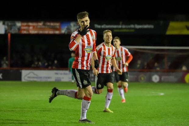 HAPPY DAYS: Ryan Colclough after scoring Altrincham’s fourth goal and making it 4-0 just before half time. Picture by Jonathan Moore