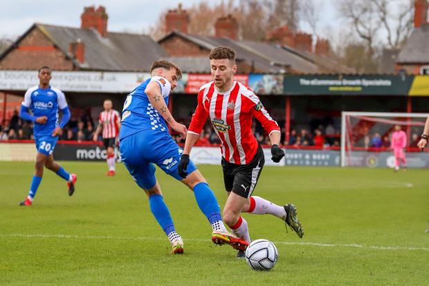 FOUL: Ryan Colclough is tripped by Eastleigh defender Andrew Boyce for a penalty that the Alty winger converted. Picture by Jonathan Moore