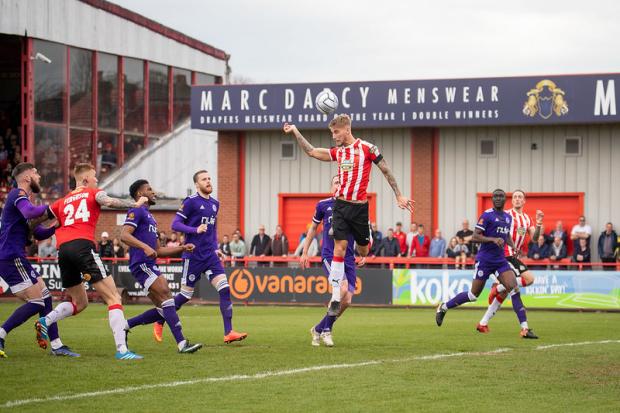 EQUALISER: Harry Perritt heads Alty level against Halifax on Good Friday from a Dan Mooney free-kick. Picture by Jonathan Moore