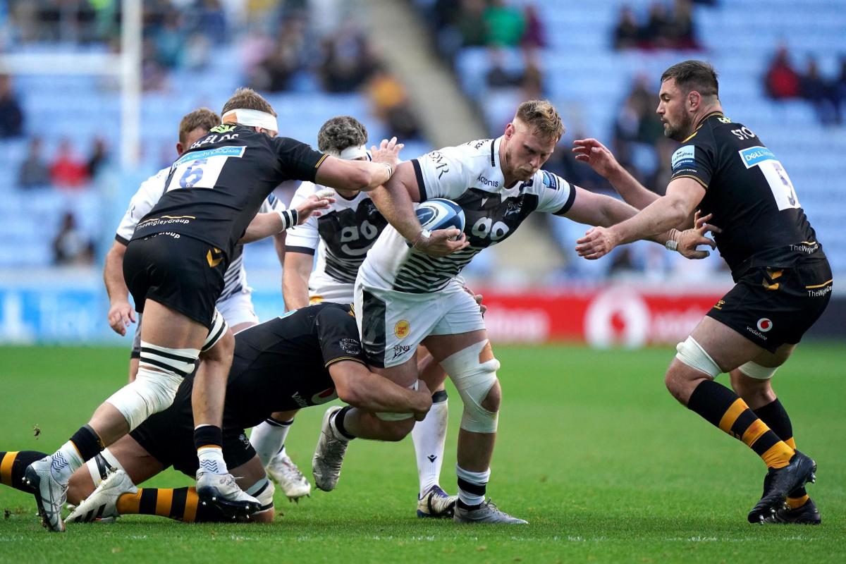 BREAKING THROUGH: Sale Sharks’ Jean-Luc du Preez, left, charges through against Wasps. Picture by Tim Goode/PA Wire