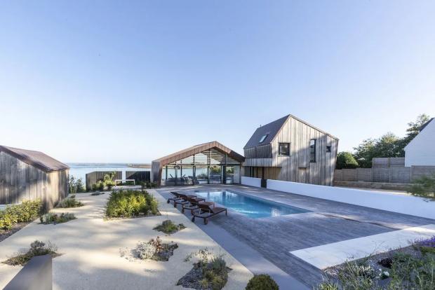 Messenger Newspapers: Modern villa with stunning sea views, swimming pool, Jaccuzi - Brittany, France. Credit: Vrbo