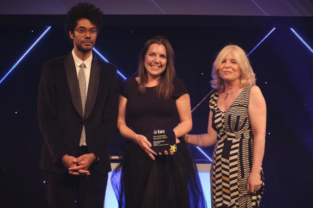 Danielle Lloyd receives the award from actor and comedian Richard Ayoade and judge Margaret Mulholland. Picture: TES Schools Awards